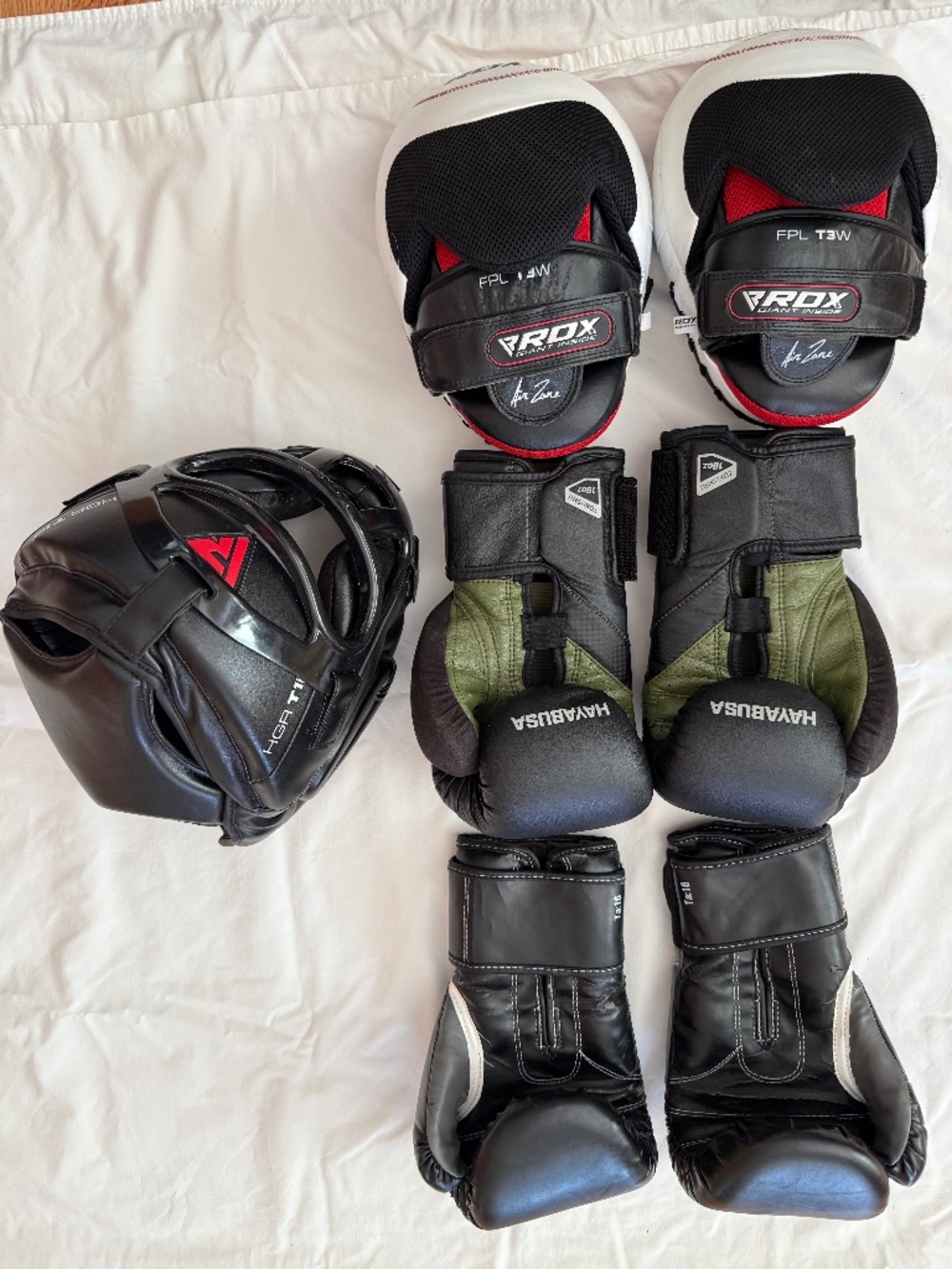 Boxing/Martial Arts Gloves, Head Gear, paddles and wraps